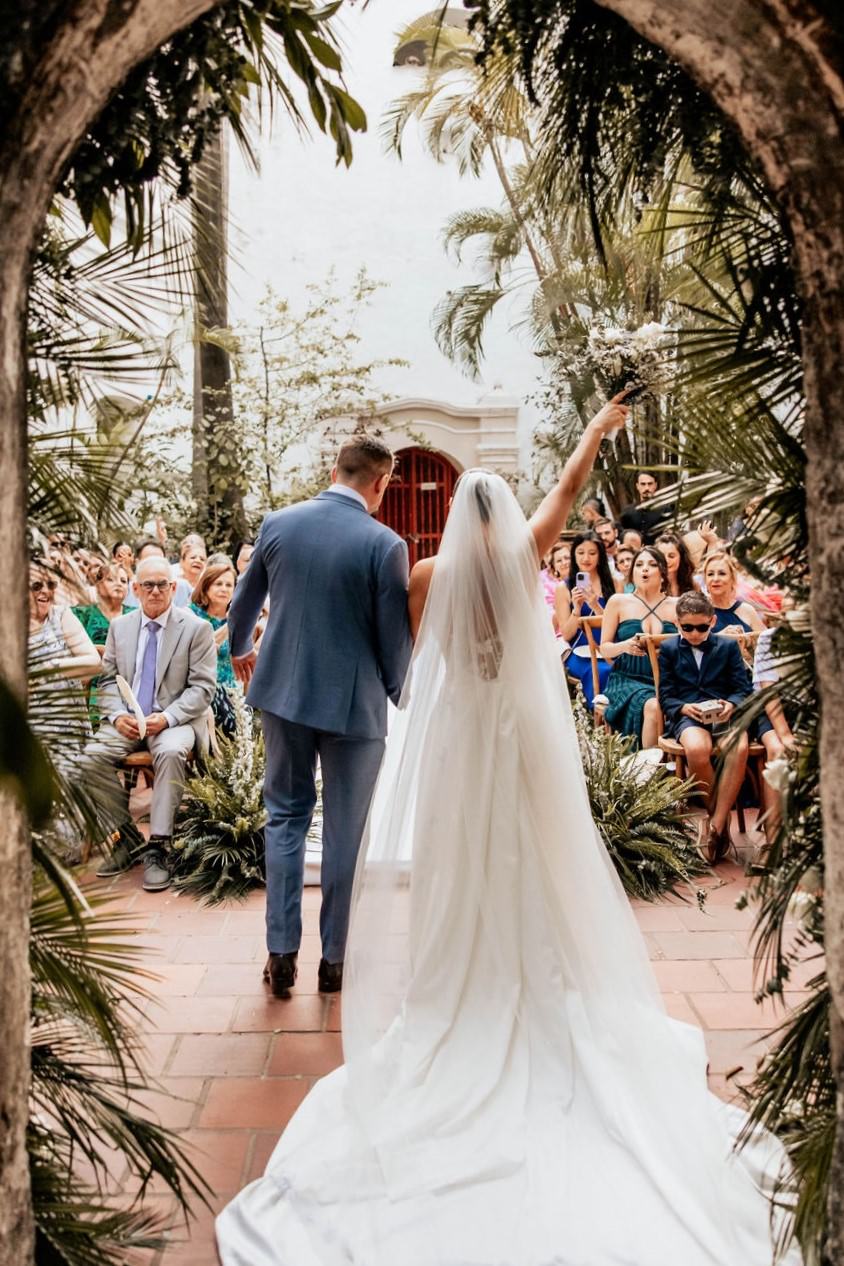 bride and groom celebrating during their church cartagena wedding ceremony
